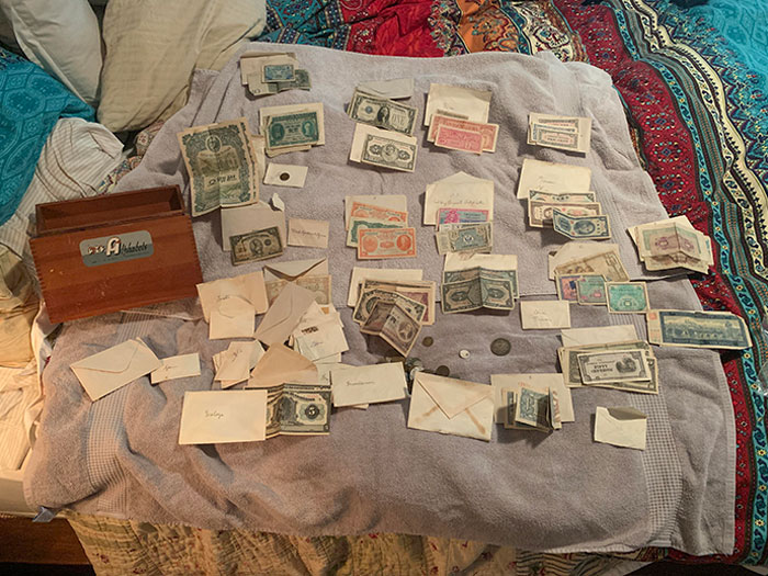 I Run Down An Old Dirt Road. Trash Is Dumped There. One Day I Stopped And Found A Box Of Money. All The Envelopes Are From Different Countries All Over The World