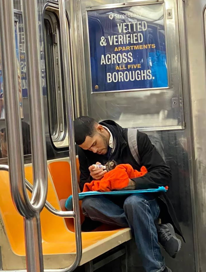 When You See A Guy Bottle Feeding A Kitten On The Subway