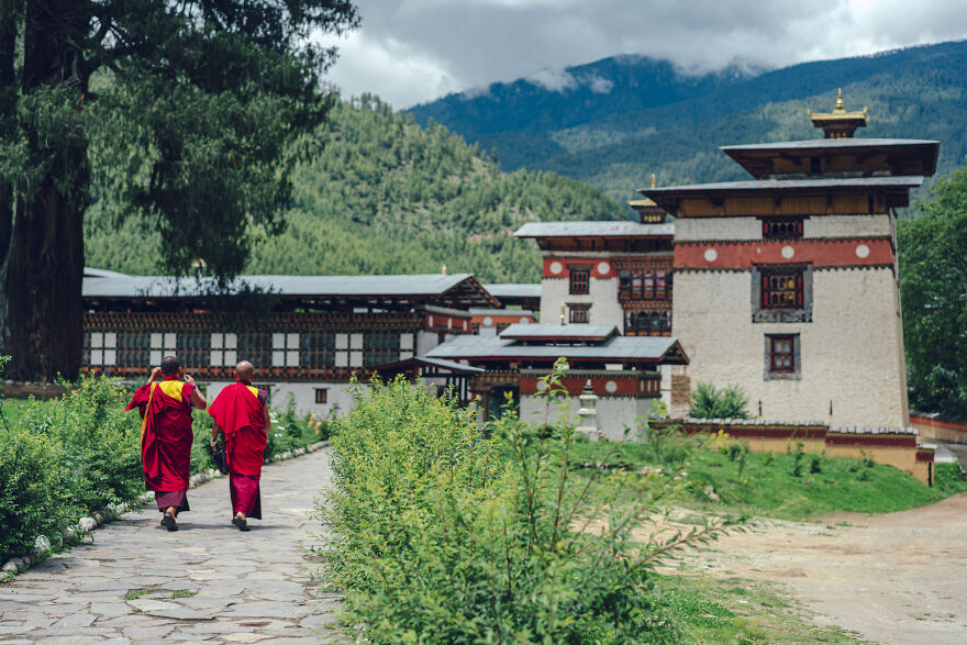 Tibetan Buddhism Has Been Deeply Rooted In Bhutan Since Long Ago. Tibetan Buddhist Monks Clad In Red Robes Can Be Seen Everywhere.
