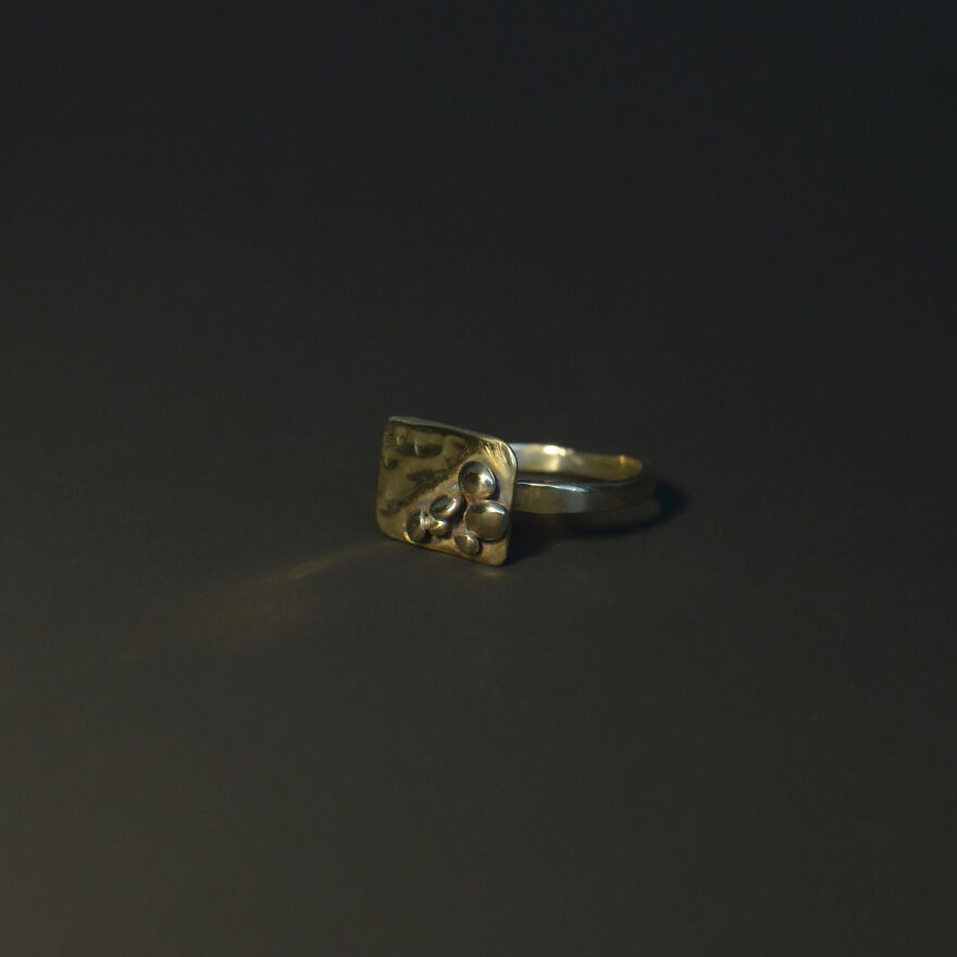 Asymmetrical Ring Decorated With Brass "Stones"