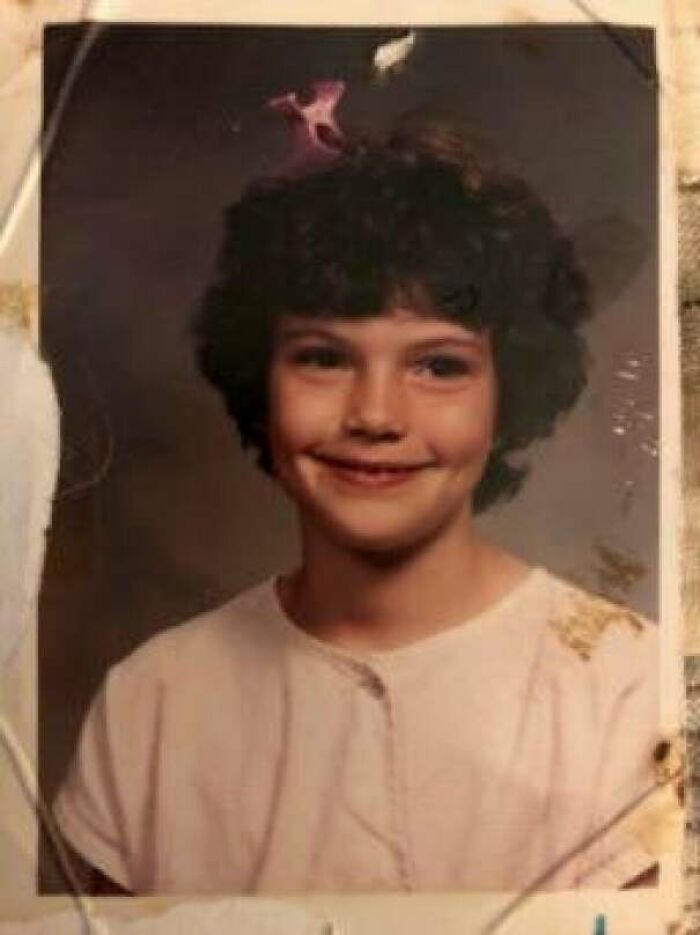 My Wife’s Grade 3 Picture. Back When The Toni Perm Was In Fashion. Just Before The Picture Was Taken She Added The Hair Clip Because She Thought It Made Her Look Pretty