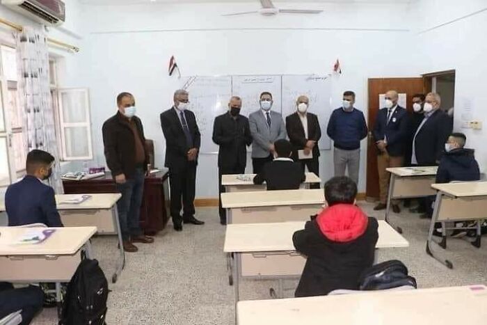10 People Explaining To 5 Students The Importance Of Social Distancing, Iraq