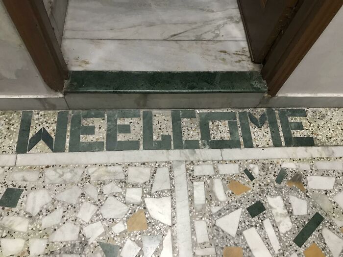 There Was An Attempt To Write Welcome In The Floor Using Stone Inlay
