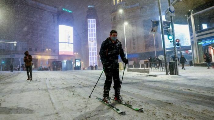Man Skiing In Madrid During Rare Snowfall In Spain