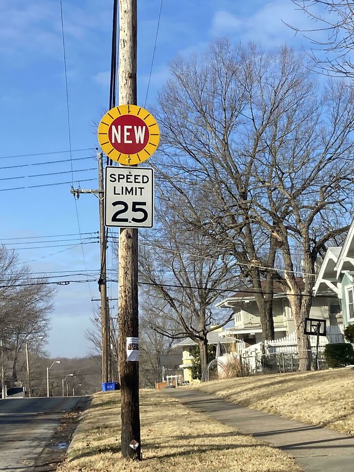 A "New" Sign Indicating That The Speed Limit Has Changed