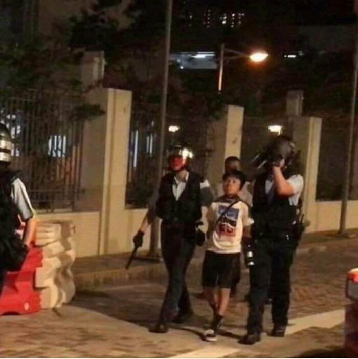 Kid(Age 10) Standing Tall After Arrested In Hong Kong For Shouting “Revolution Of Our Time, Glory To Hong Kong”
