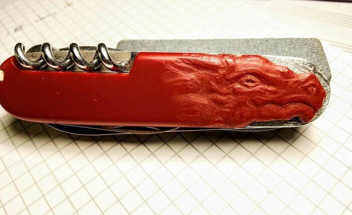A Piece Of My Swiss Army Knife's Handle Chipped Off, So I Carved A Dragon's Head In The Plastic To Hide It