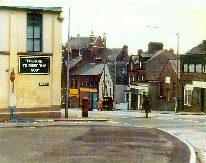 A British Army Bomb Disposal Specialist Approaches A Suspect Vehicle In Belfast, 1970s