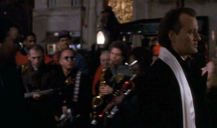There's Been A Lot Of Posts About Scrooged (1988), But No One Has Mentioned That The Street Band Playing We Three Kings Are Miles Davis, Paul Shaffer, Larry Carlton, And David Sanborn