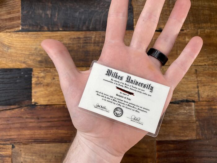 My University Sent Me A Wallet-Sized Diploma. Hand For Scale