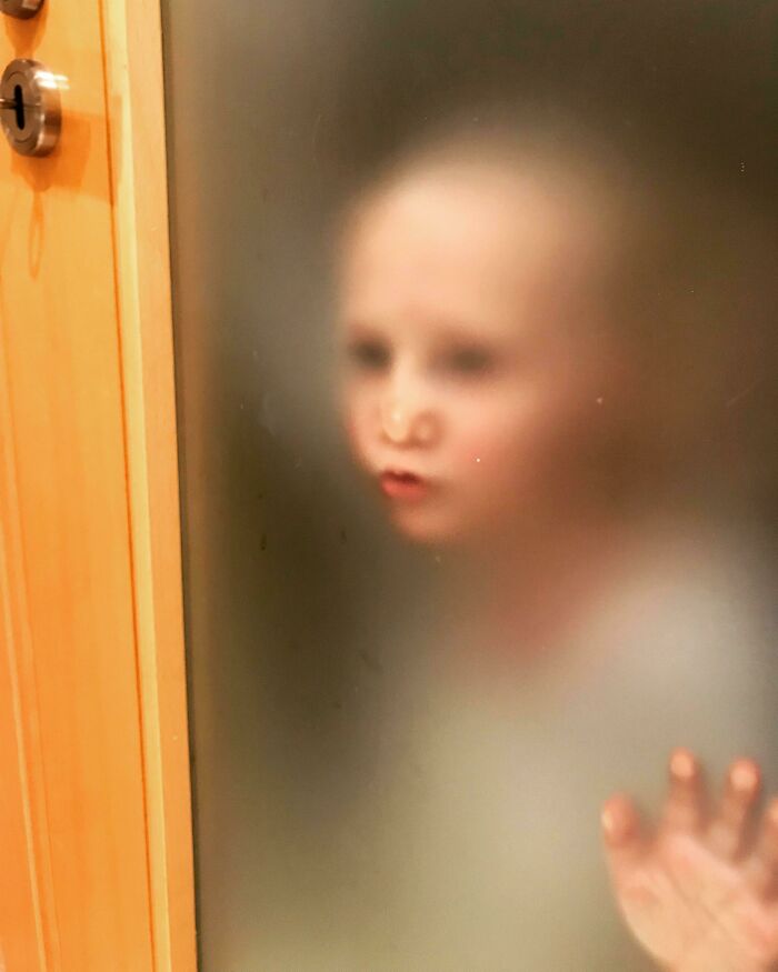 Our Airbnb Had A Translucent Bathroom Door. I’m Used To My Impatient Toddler Stalking Me Through The Bathroom Door, But This Took It To A Much Creepier Level
