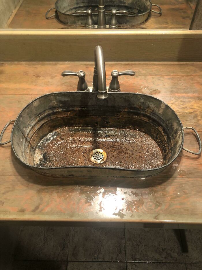 Rusted Sink At Restaurant
