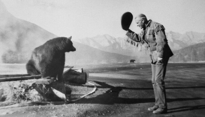 Conrad O'brien-Ffrench Greets A Bear. Having Spent His Youth As A Mountie, Surviving The First World War And Serving As An Mi6 Agent In The Second World War, He Was Known To Welcome Danger. Banff National Park, 1950. Photo Taken By Rosalie French
