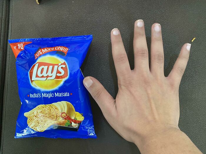 How Small ₹10 Lays Have Gotten, Hand For Scale