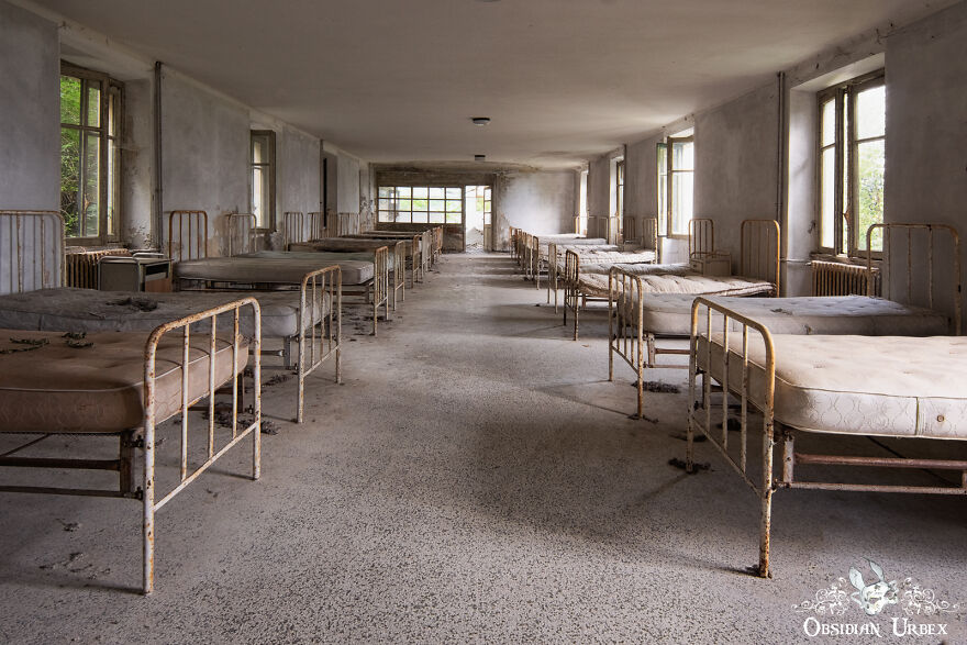 A Children's Dormitory Inside An Abandoned Sanatorium. In The Years Before Antibiotics, Sunlight And Fresh Air Was Used To Treat Patients With Many Respiratory Diseases Including Tuberculosis.
