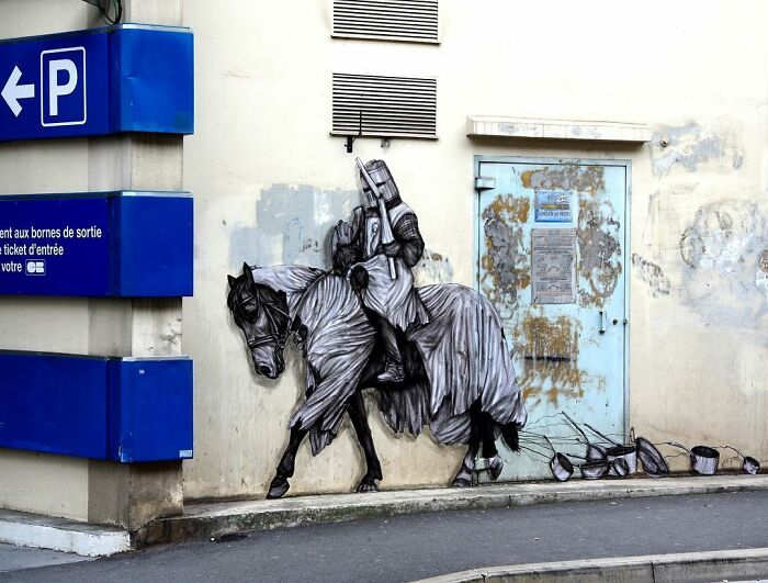 French Artist Brings Life To Buildings And Monotonous Objects On Parisian Streets With His Art