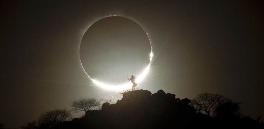 Hybrid Solar Eclipse And Maasai Warrior
