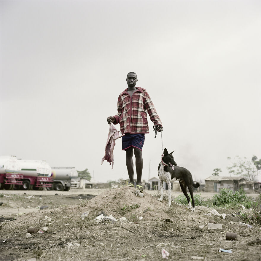 Abdullahi Mohammed With Wild Dog And Antelope Carcass, Ogere-Remo, Nigeria, 2007, "The Hyena And Other Men"