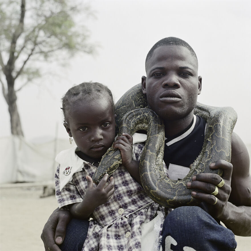Mummy Ahmadu And A Snake Charmer With A Rock Python, Abuja, Nigeria, 2005, "The Hyena And Other Men"