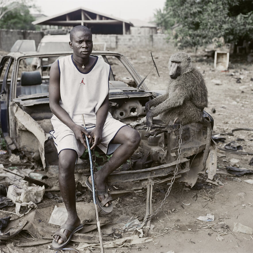 Umoru Murtala With School Boy, Asaba, Nigeria, 2007, "The Hyena And Other Men"