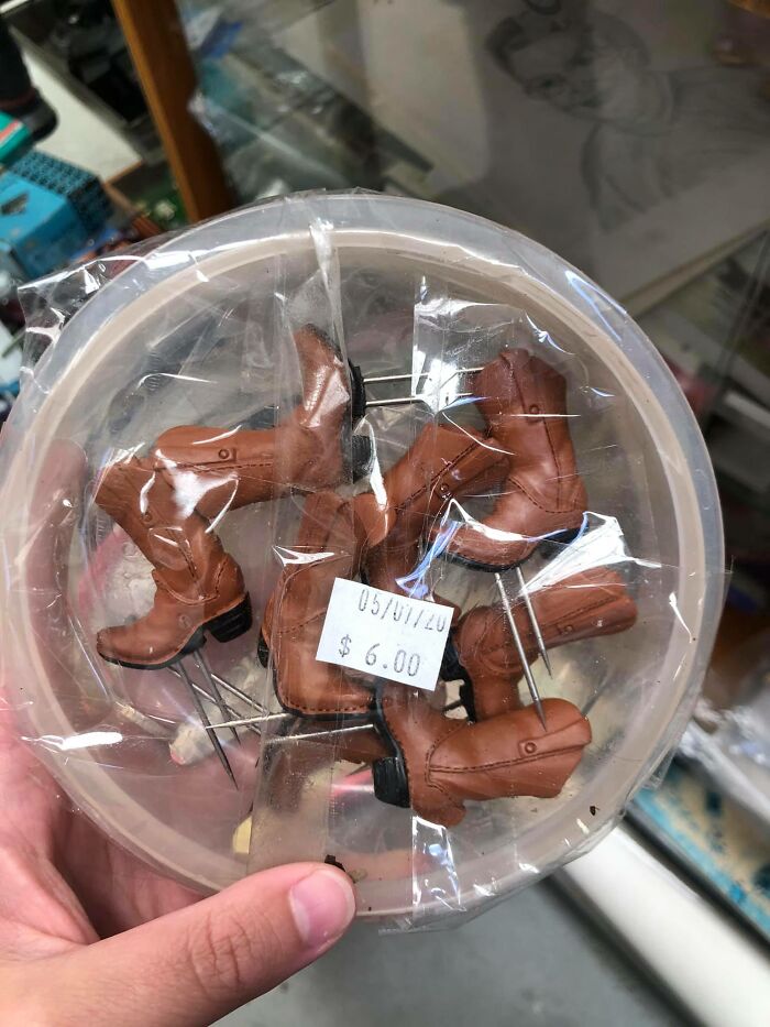 I Have A Lot Of Questions About This Find. Are They For Holding Corn? Is There A Connection Between Corn And Cowboys? And Do I Need To Bring Them Home For The Bargain Price Of Just $6? 4 Pairs Of ... Spiked Mini Cowboy Boots Designed For An Unknown Purpose, Spotted In A Tip Shop In Tasmania