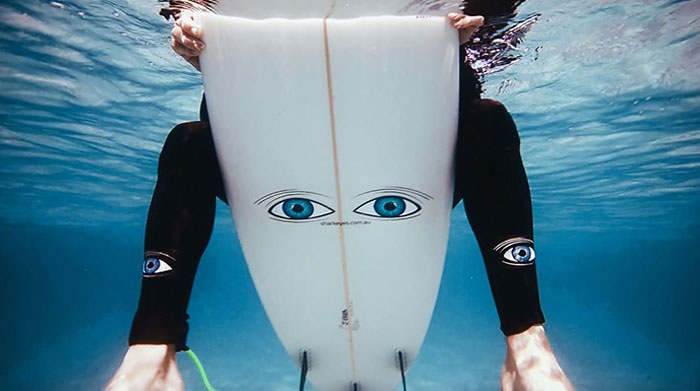 Surfers Are Putting Eyes On The Bottom Of Their Boards To Freak Out Sharks