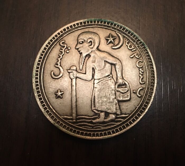 I Found This Old Coin Of A Man On Pilgrimage Somewhere In Africa.