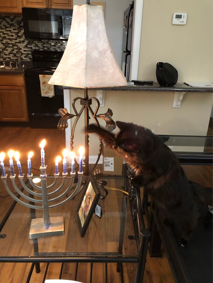 Helping Mom Put Out The Candles