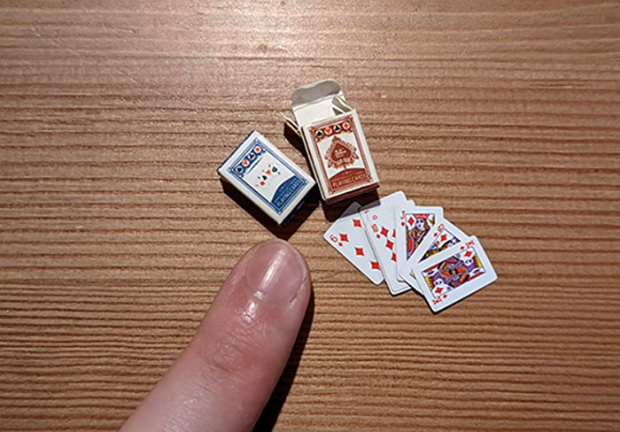 These Tiny Decks Of Cards (Compared To A Finger)