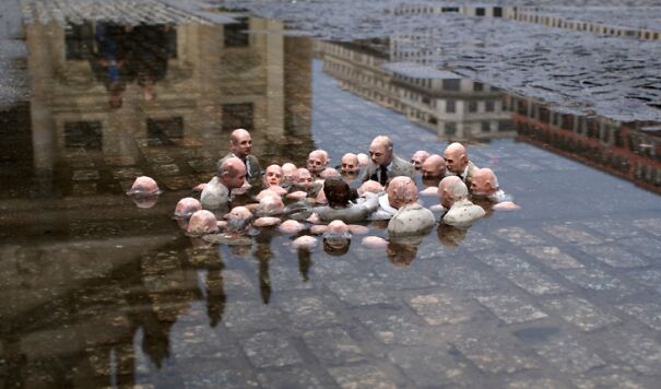 politicians-discussing-global-warming-sculpture-by-isaac-cordal-berlin-5ffeb849600c0.jpg