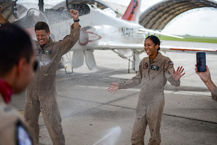 Pilot Celebrates At Her Graduation As The First Black Female Tactical Jet Pilot In US Navy History