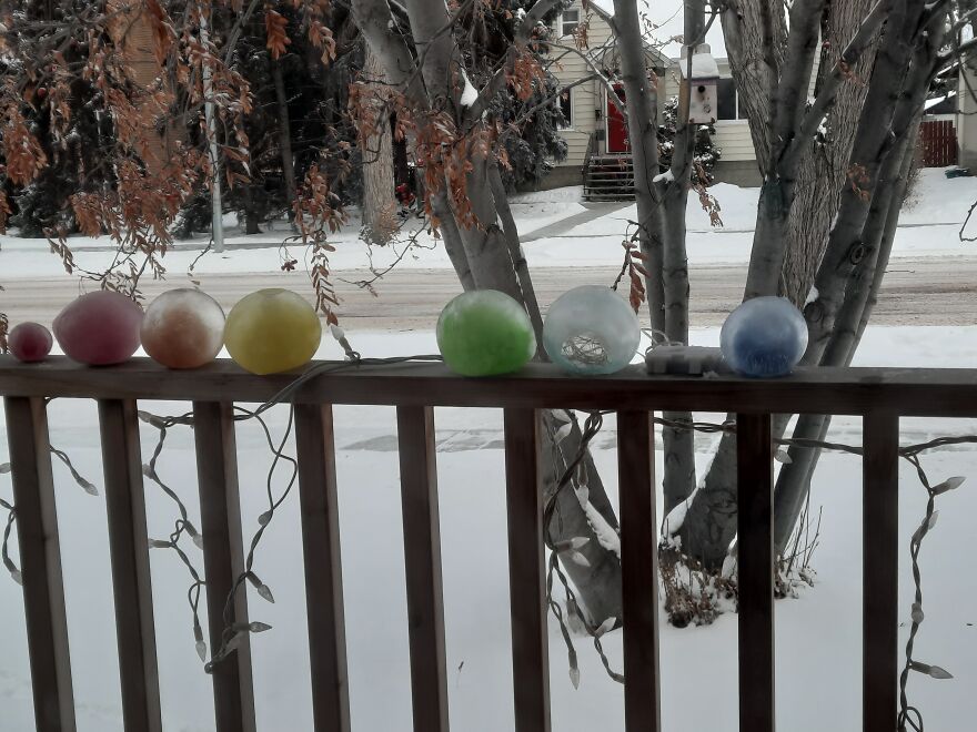 Ice Marbles On The Railing