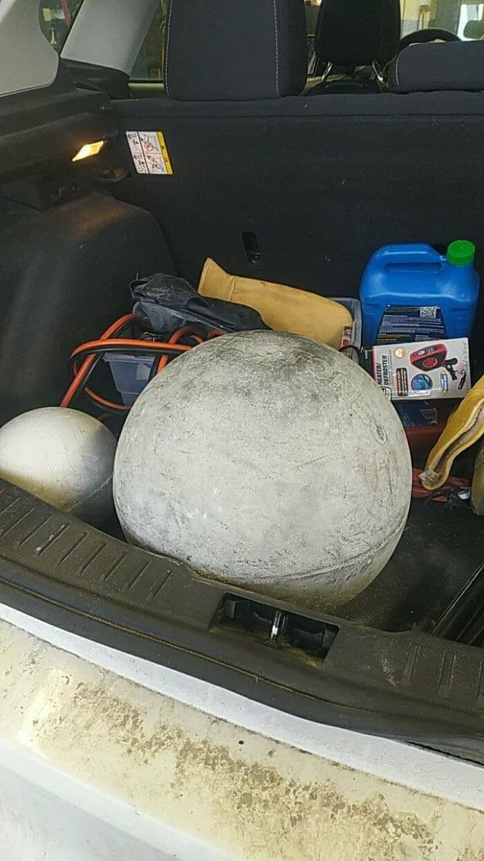 Customer Asked Me To Put Their Spare Tire On. Saw A Cement Atlas Ball In The Back. Those Things Are Solid Concrete And This Thing Weights Like 150lbs. I Said No Way. I'm Not Blowing Out My Back On A Job I'm Not Being Paid For
