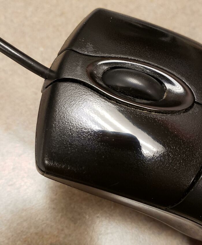 An Office Computer Mouse That's Been Clicked To A Mirror Finish
