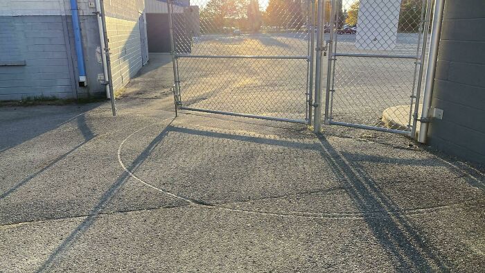 This Groove In The Pavement Made From The Gate