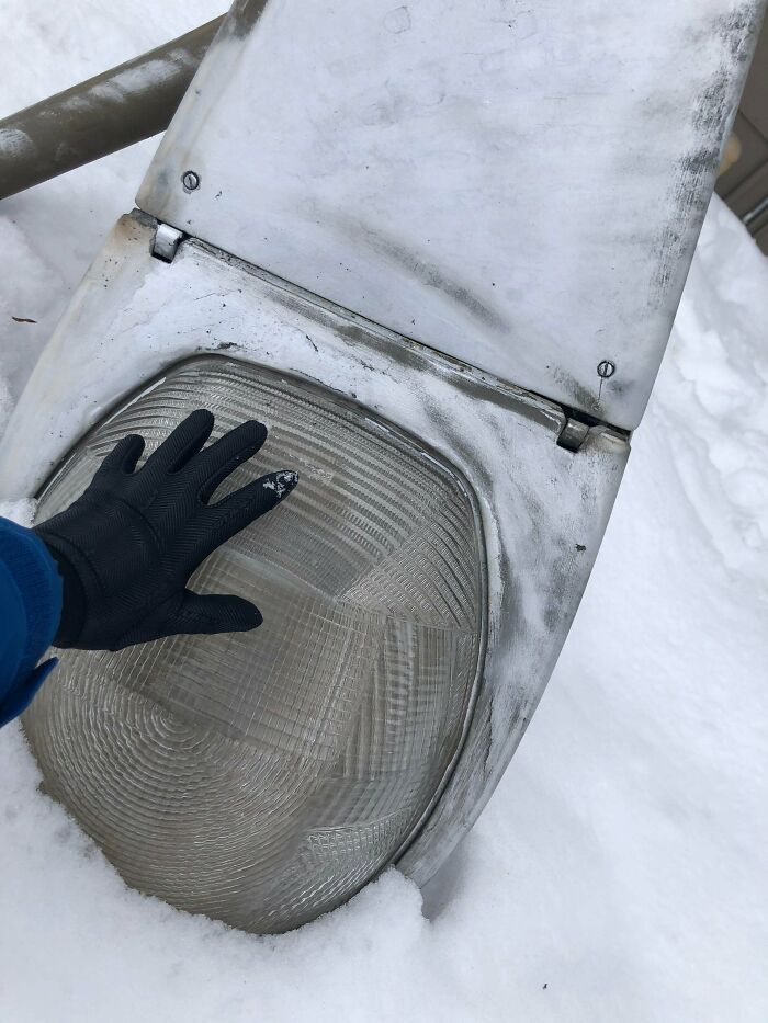 A Street Lamp Fell Over Into The Snow Outside My Apartment. Turns Out They’re Massive- My Hand For Scale