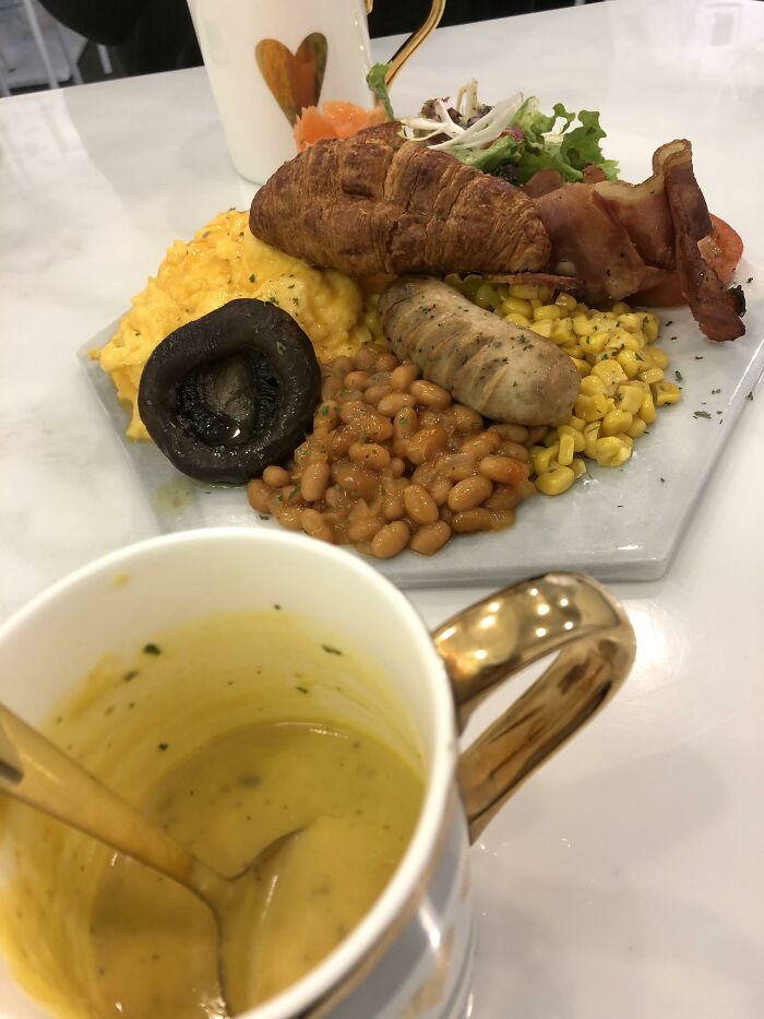 All Day Breakfast Served On A Tile, And Soup In A Mug