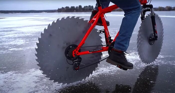 Man Replaces Bike Tires With Circular Saws And Goes For A Spin On A Frozen Lake