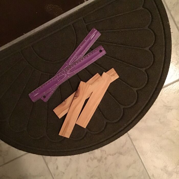 Rubber Rulers And Wooden Shims Left On My Doormat The Day My Neighbor Moved Out.