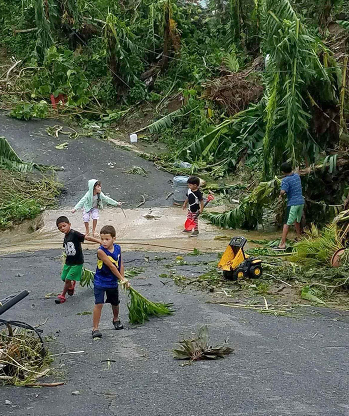 Kids Clearing Up The Roads With Their Toys In Puerto Rico. They Are Doing What They Can And That's Awesome