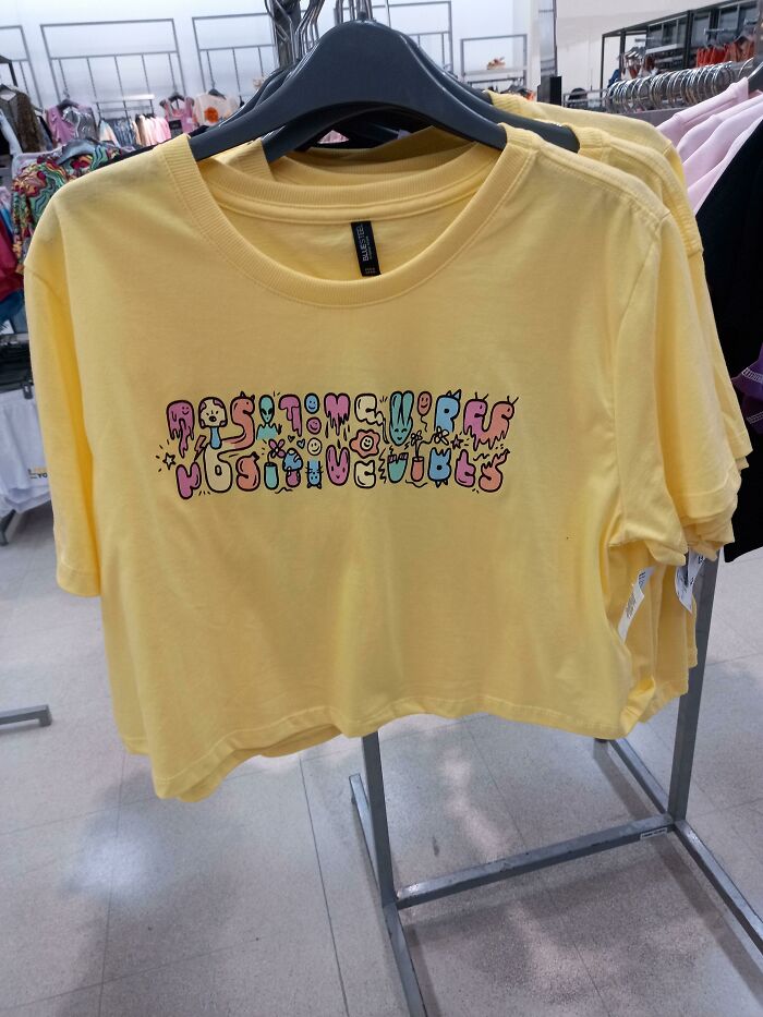 Cute T-Shirt, Cute Letters, But I Can't Figure Out What This Is Supposed To Mean