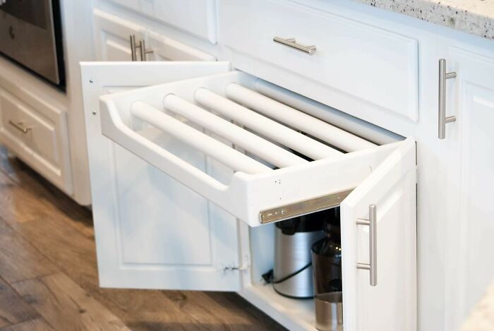 This Rack Type Drawer Is Mounted In A Kitchen Cabinet. This Is As Far As It Pulls Out And The Bars Do Not Rotate Or Come Out