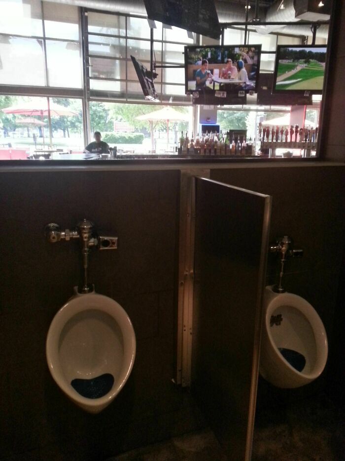 This Sports Bar Has One Way Glass In The Bathrooms So You Don't Miss Any Of The Game
