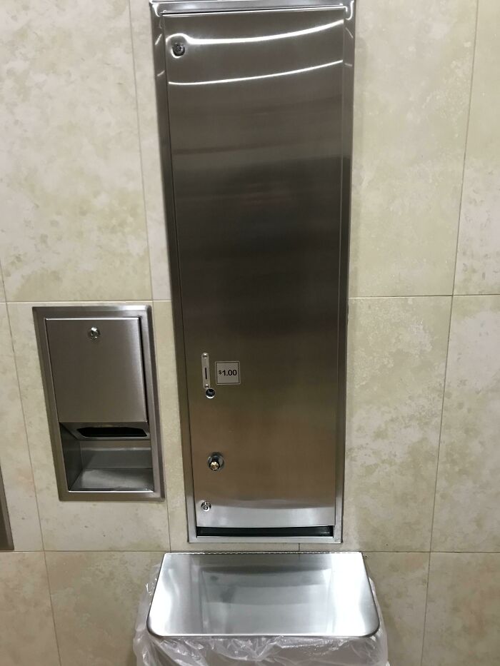 Diaper Dispenser For Men With Babies In A Walmart’s Men’s Restroom