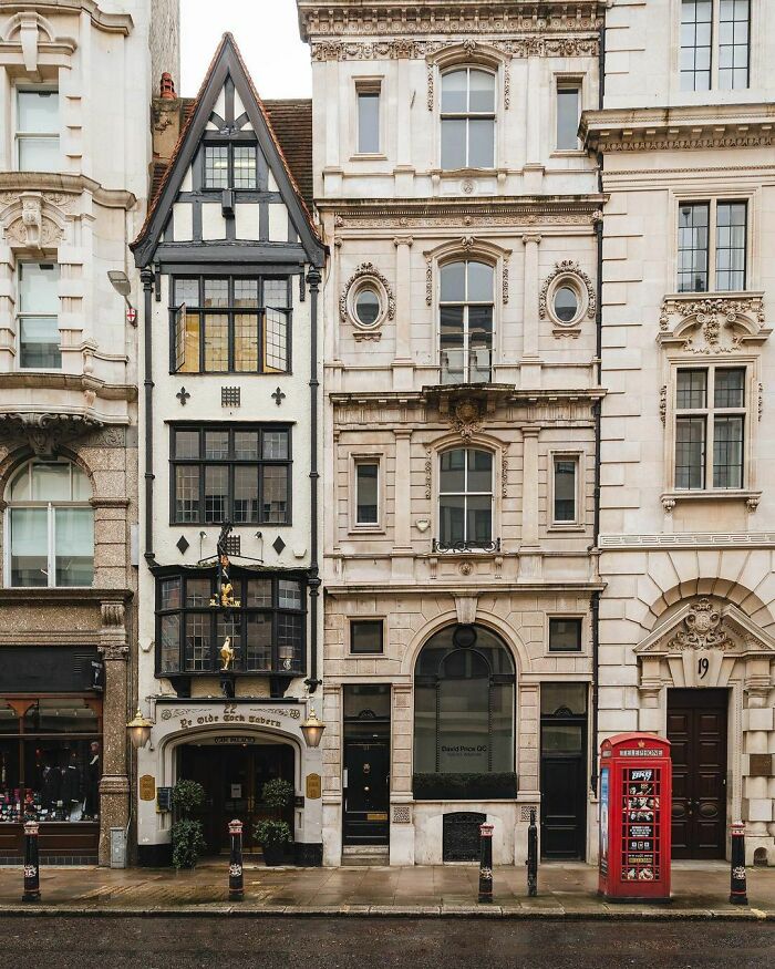 Ye Olde Cock Tavern, A Historic Pub Originally Built Before The 17th Century And Then Rebuilt, Stuck Between Other Architectural Styles Of Fleet Street, The City Of London, UK
