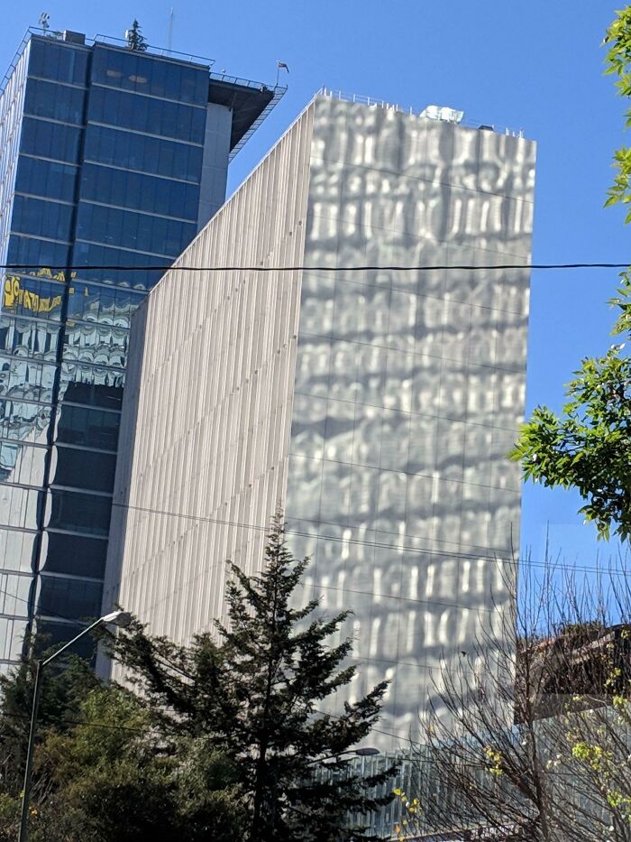 The Reflections In This Building Make It Look Like A Bad Render