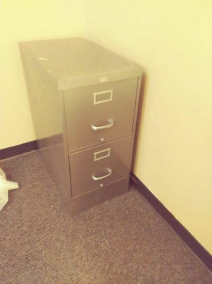 The Shine On This Filing Cabinet Makes It Look Like It's Fading Away
