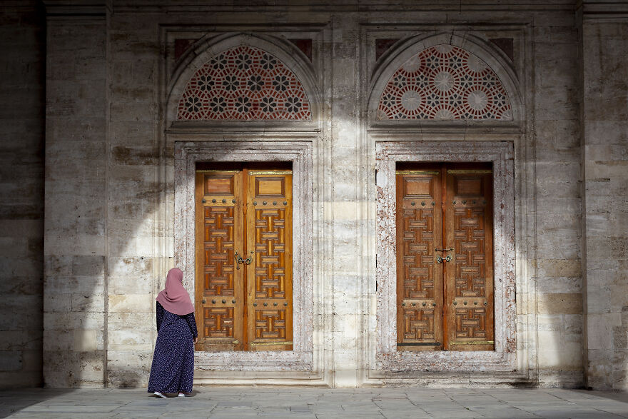 Photo Taken At The Courtyard Of The Suleymaniye Mosque. I Like The Shadow Of The Arch As A Frame And The Woman Walking Towards The Doors Create A Mystery