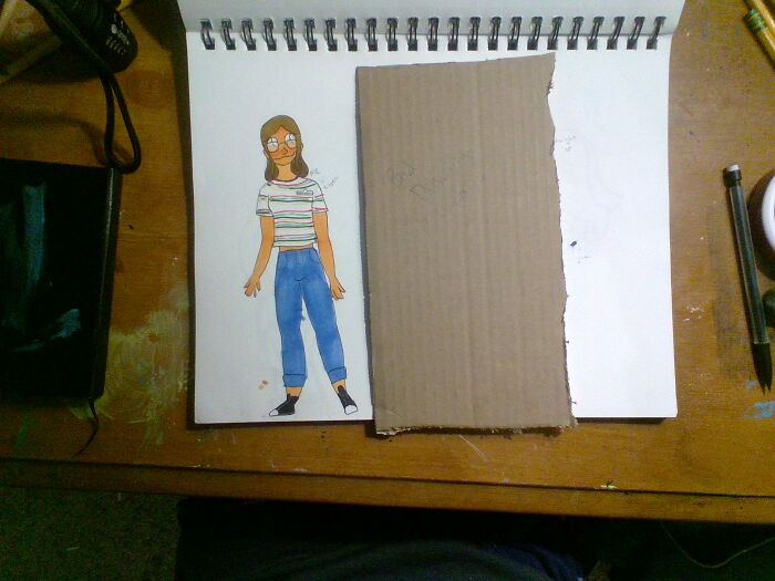 A Self Portrait I Did Once I Found My Style! (Don't Mind The Cardboard It's Covering Up Some Of My Other Drawings)
