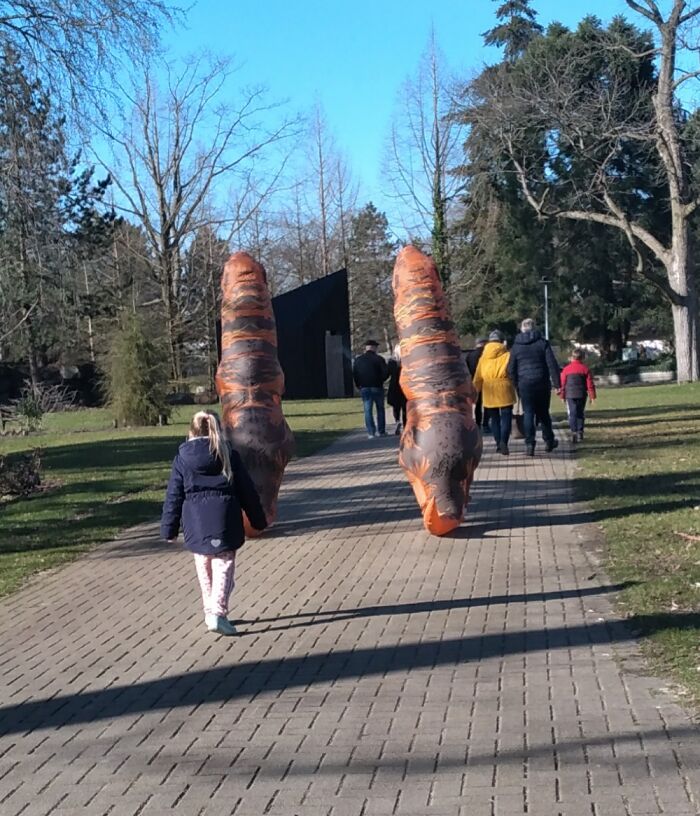 Just Two Dinosaurs Having A Stroll In The Park
